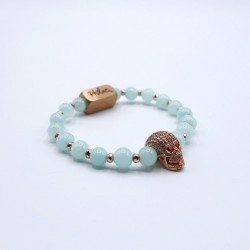 Blue bracelet of agate with golden strassed skullhead