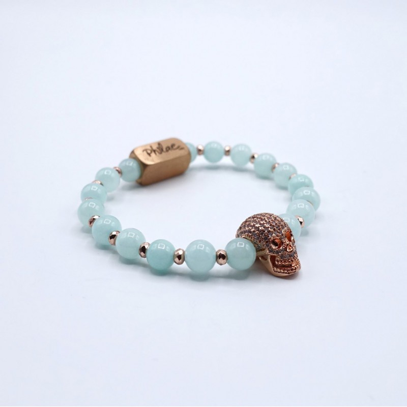 Blue bracelet of agate with golden strassed skullhead